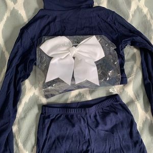 Cheerleading basics: shirt shorts and bow